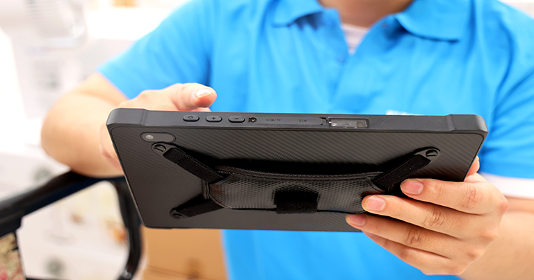 Scanner tablet used for retail inventory counting, SKU scanning and shelf label verification in retail store